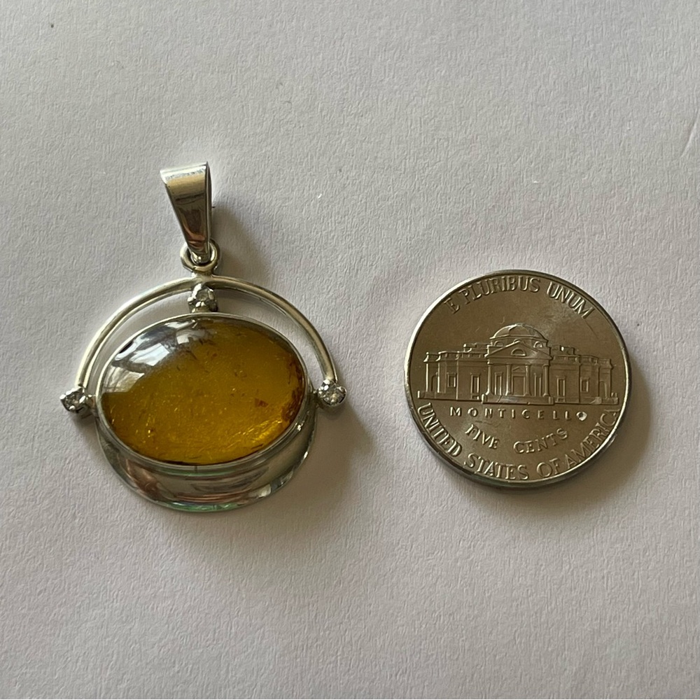 Elegant Silver and Amber Pendant